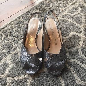 Metallic silver heels